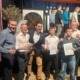 Gruppenfoto der ausgezeichneten Kickboxer, Boxer und Thaiboxer bei der Sportlerehrung 2026 in Bergisch Gladbach nach Erfolgen bei Deutschen und Europameisterschaften